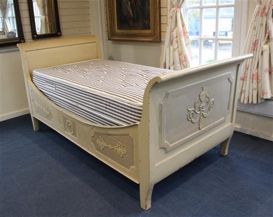 A late 19th century French painted wood bateau lit, W.7ft D.3ft 8in. H.3ft 6in.